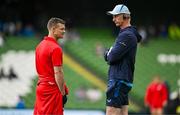 31 May 2025; Scarlets head coach Dwayne Peel, left, and Leinster head coach Leo Cullen before the United Rugby Championship quarter-final match between Leinster and Scarlets at the Aviva Stadium in Dublin. Photo by Brendan Moran/Sportsfile