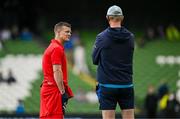 31 May 2025; Scarlets head coach Dwayne Peel, left, and Leinster head coach Leo Cullen before the United Rugby Championship quarter-final match between Leinster and Scarlets at the Aviva Stadium in Dublin. Photo by Brendan Moran/Sportsfile