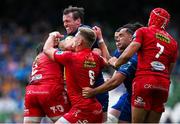 31 May 2025; Ryan Baird of Leinster is tackled by Ryan Elias and Taine Plumtree of Scarlets during the United Rugby Championship quarter-final match between Leinster and Scarlets at the Aviva Stadium in Dublin. Photo by Brendan Moran/Sportsfile