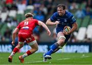 31 May 2025; Ryan Baird of Leinster in action against Arhie Hughes of Scarlets during the United Rugby Championship quarter-final match between Leinster and Scarlets at the Aviva Stadium in Dublin. Photo by Brendan Moran/Sportsfile