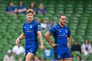 31 May 2025; Leinster players Jordie Barrett, left, and James Lowe during the United Rugby Championship quarter-final match between Leinster and Scarlets at the Aviva Stadium in Dublin. Photo by Seb Daly/Sportsfile