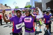 1 June 2025; Participants Kat Balogun, right, and Juliette Aimuanmwosa after the 2025 Vhi Women’s Mini Marathon. More than 28,500 women from all over the country took to the streets of Dublin to run, walk and jog the 10km route, raising much needed funds for hundreds of charities. For further information please log on to www.vhiwomensminimarathon.ie Photo by Seb Daly/Sportsfile
