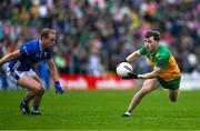 1 June 2025; Shane O'Donnell of Donegal in action against Padraig Faulkner of Cavan during the GAA Football All-Ireland Senior Championship Round 2 match between Cavan and Donegal at Kingspan Breffni in Cavan. Photo by Brendan Moran/Sportsfile