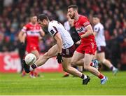 1 June 2025; Liam Silke of Galway in action against Niall Loughlin of Derry during the GAA Football All-Ireland Senior Championship Round 2 match between Derry and Galway at Celtic Park in Derry. Photo by Piaras Ó Mídheach/Sportsfile