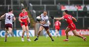 1 June 2025; John Maher of Galway in action against Shane McGuigan of Derry during the GAA Football All-Ireland Senior Championship Round 2 match between Derry and Galway at Celtic Park in Derry. Photo by Piaras Ó Mídheach/Sportsfile