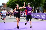 1 June 2025; Participants after the 2025 Vhi Women’s Mini Marathon. More than 28,500 women from all over the country took to the streets of Dublin to run, walk and jog the 10km route, raising much needed funds for hundreds of charities. For further information please log on to www.vhiwomensminimarathon.ie Photo by Seb Daly/Sportsfile