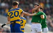31 May 2025; Shane Cunnane of Roscommon and Ciarán Caulfield of Meath tussle during the GAA Football All-Ireland Senior Championship Round 2 match between Roscommon and Meath at King & Moffatt Dr Hyde Park in Roscommon. Photo by Tom Beary/Sportsfile