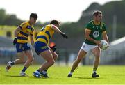 31 May 2025; Donal Keogan of Meath in action against Enda Smith of Roscommon during the GAA Football All-Ireland Senior Championship Round 2 match between Roscommon and Meath at King & Moffatt Dr Hyde Park in Roscommon. Photo by Tom Beary/Sportsfile