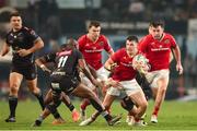 31 May 2025; Calvin Nash of Munster attempts to slip the tackle during the United Rugby Championship quarter-final match between Hollywoodbets Sharks and Munster at Kings Park Stadium in Durban, South Africa. Photo by Shaun Roy/Sportsfile