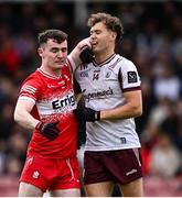 1 June 2025; Diarmuid Baker of Derry and Robert Finnerty of Galway tussle during the GAA Football All-Ireland Senior Championship Round 2 match between Derry and Galway at Celtic Park in Derry. Photo by Piaras Ó Mídheach/Sportsfile