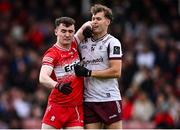 1 June 2025; Diarmuid Baker of Derry and Robert Finnerty of Galway tussle during the GAA Football All-Ireland Senior Championship Round 2 match between Derry and Galway at Celtic Park in Derry. Photo by Piaras Ó Mídheach/Sportsfile