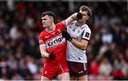 1 June 2025; Diarmuid Baker of Derry and Robert Finnerty of Galway tussle during the GAA Football All-Ireland Senior Championship Round 2 match between Derry and Galway at Celtic Park in Derry. Photo by Piaras Ó Mídheach/Sportsfile