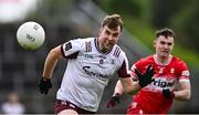 1 June 2025; Paul Conroy of Galway in action against Diarmuid Baker of Derry during the GAA Football All-Ireland Senior Championship Round 2 match between Derry and Galway at Celtic Park in Derry. Photo by Piaras Ó Mídheach/Sportsfile