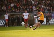 31 May 2025; Tyrone goalkeeper Niall Morgan scores a two-pointer from a free during the GAA Football All-Ireland Senior Championship Round 2 match between Tyrone and Mayo at O'Neills Healy Park in Omagh, Tyrone. Photo by Piaras Ó Mídheach/Sportsfile