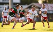 31 May 2025; Michael McKernan of Tyrone in action against David McBrien of Mayo during the GAA Football All-Ireland Senior Championship Round 2 match between Tyrone and Mayo at O'Neills Healy Park in Omagh, Tyrone. Photo by Piaras Ó Mídheach/Sportsfile