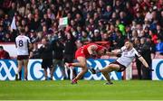 1 June 2025; Ciarán McFaul of Derry tussles off the ball with Damien Comer of Galway as Comer makes his way onto the pitch as a substitute during the GAA Football All-Ireland Senior Championship Round 2 match between Derry and Galway at Celtic Park in Derry. Photo by Piaras Ó Mídheach/Sportsfile