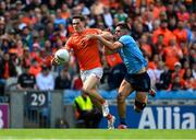 1 June 2025; Jarly Óg Burns of Armagh in action against Theo Clancy of Dublin during the GAA Football All-Ireland Senior Championship Round 2 match between Dublin and Armagh at Croke Park in Dublin. Photo by Daire Brennan/Sportsfile