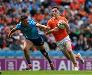 1 June 2025; Jarly Óg Burns of Armagh in action against Theo Clancy of Dublin during the GAA Football All-Ireland Senior Championship Round 2 match between Dublin and Armagh at Croke Park in Dublin. Photo by Daire Brennan/Sportsfile