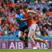 1 June 2025; Jarly Óg Burns of Armagh in action against Theo Clancy of Dublin during the GAA Football All-Ireland Senior Championship Round 2 match between Dublin and Armagh at Croke Park in Dublin. Photo by Daire Brennan/Sportsfile