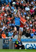 1 June 2025; Peadar Ó Cofaigh Byrne of Dublin in action against Ben Crealey of Armagh during the GAA Football All-Ireland Senior Championship Round 2 match between Dublin and Armagh at Croke Park in Dublin. Photo by Daire Brennan/Sportsfile