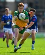 1 June 2025; Ciarán Moore of Donegal in action against Cian Reilly of Cavan during the GAA Football All-Ireland Senior Championship Round 2 match between Cavan and Donegal at Kingspan Breffni in Cavan. Photo by Brendan Moran/Sportsfile