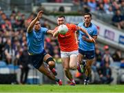 1 June 2025; Oisin Conaty of Armagh in action against Theo Clancy of Dublin during the GAA Football All-Ireland Senior Championship Round 2 match between Dublin and Armagh at Croke Park in Dublin. Photo by Daire Brennan/Sportsfile