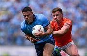 1 June 2025; Brian Howard of Dublin in action against Ross McQuillan of Armagh during the GAA Football All-Ireland Senior Championship Round 2 match between Dublin and Armagh at Croke Park in Dublin. Photo by Daire Brennan/Sportsfile