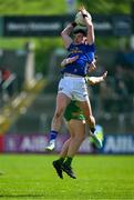 1 June 2025; Cian Reilly of Cavan fields a kickout ahead of Jamie Brennan of Donegal during the GAA Football All-Ireland Senior Championship Round 2 match between Cavan and Donegal at Kingspan Breffni in Cavan. Photo by Brendan Moran/Sportsfile