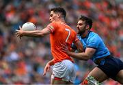 1 June 2025; Jarly Óg Burns of Armagh in action against Sean MacMahon of Dublin during the GAA Football All-Ireland Senior Championship Round 2 match between Dublin and Armagh at Croke Park in Dublin. Photo by Daire Brennan/Sportsfile