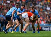 1 June 2025; Jason Duffy of Armagh in action against Dublin players, left to right, Ciaran Kilkenny, Alex Gavin, and Sean Bugler during the GAA Football All-Ireland Senior Championship Round 2 match between Dublin and Armagh at Croke Park in Dublin. Photo by Daire Brennan/Sportsfile