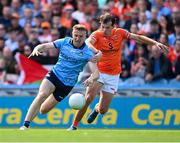 1 June 2025; Paddy Small of Dublin is tackled by Barry McCambridge of Armagh during the GAA Football All-Ireland Senior Championship Round 2 match between Dublin and Armagh at Croke Park in Dublin. Photo by Ray McManus/Sportsfile