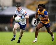 1 June 2025; Stephen O'Hanlon of Monaghan in action against Ikem Ugweuru of Clare during the GAA Football All-Ireland Senior Championship Round 2 match between Monaghan and Clare at St Tiernach’s Park in Clones, Monaghan. Photo by Michael P Ryan/Sportsfile