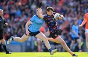 1 June 2025; Armagh goalkeeper Ethan Rafferty with Paddy Small of Dublin in persuit as he runs through to score a point during the GAA Football All-Ireland Senior Championship Round 2 match between Dublin and Armagh at Croke Park in Dublin. Photo by Ray McManus/Sportsfile
