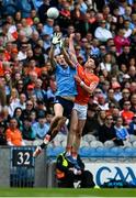 1 June 2025; Peadar Ó Cofaigh Byrne of Dublin in action against Ben Crealey of Armagh during the GAA Football All-Ireland Senior Championship Round 2 match between Dublin and Armagh at Croke Park in Dublin. Photo by Daire Brennan/Sportsfile