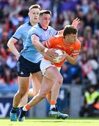 1 June 2025; Ross McQuillan of Armagh in action against Brian Howard of Dublin, 6, during the GAA Football All-Ireland Senior Championship Round 2 match between Dublin and Armagh at Croke Park in Dublin. Photo by Ray McManus/Sportsfile