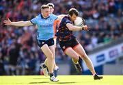 1 June 2025; Armagh goalkeeper Ethan Rafferty is tackled by Paddy Small of Dublin as he runs through to score a point during the GAA Football All-Ireland Senior Championship Round 2 match between Dublin and Armagh at Croke Park in Dublin. Photo by Ray McManus/Sportsfile