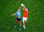 1 June 2025; Brian Howard of Dublin in action against Jarly Óg Burns of Armagh during the GAA Football All-Ireland Senior Championship Round 2 match between Dublin and Armagh at Croke Park in Dublin. Photo by Dáire Brennan/Sportsfile