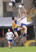 1 June 2025; Gary Mohan of Monaghan in action against Brian McNamara of Clare during the GAA Football All-Ireland Senior Championship Round 2 match between Monaghan and Clare at St Tiernach’s Park in Clones, Monaghan. Photo by Michael P Ryan/Sportsfile