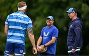 2 June 2025; Senior coach Jacques Nienaber, centre, speaks with head coach Leo Cullen, right, and RG Snyman during a Leinster Rugby squad training session at UCD in Dublin. Photo by Shauna Clinton/Sportsfile