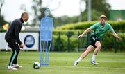 2 June 2025; Nathan Collins, right, and head coach Heimir Hallgrimsson during a Republic of Ireland training session at the FAI National Training Centre in Abbotstown, Dublin. Photo by Seb Daly/Sportsfile