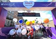 1 June 2025; Pacers during the 2025 Vhi Women’s Mini Marathon. More than 28,500 women from all over the country took to the streets of Dublin to run, walk and jog the 10km route, raising much needed funds for hundreds of charities. For further information please log on to www.vhiwomensminimarathon.ie Photo by David Fitzgerald/Sportsfile