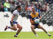 1 June 2025; Eoin Cleary of Clare in action against Dessie Ward of Monaghan during the GAA Football All-Ireland Senior Championship Round 2 match between Monaghan and Clare at St Tiernach’s Park in Clones, Monaghan. Photo by Michael P Ryan/Sportsfile