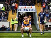 1 June 2025; Eoin Cleary of Clare waits for his teammates for the team photograph before the GAA Football All-Ireland Senior Championship Round 2 match between Monaghan and Clare at St Tiernach’s Park in Clones, Monaghan. Photo by Michael P Ryan/Sportsfile