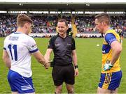 1 June 2025; Referee Jerome Henry with team captains Mícheál Bannigan of Monaghan, left, and Eoin Cleary of Clare before the GAA Football All-Ireland Senior Championship Round 2 match between Monaghan and Clare at St Tiernach’s Park in Clones, Monaghan. Photo by Michael P Ryan/Sportsfile