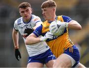 1 June 2025; Dermot Coughlan of Clare in action against Mícheál McCarville of Monaghan during the GAA Football All-Ireland Senior Championship Round 2 match between Monaghan and Clare at St Tiernach’s Park in Clones, Monaghan. Photo by Michael P Ryan/Sportsfile