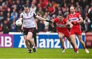1 June 2025; Céin D’Arcy of Galway in action against Ciarán McFaul of Derry during the GAA Football All-Ireland Senior Championship Round 2 match between Derry and Galway at Celtic Park in Derry. Photo by Piaras Ó Mídheach/Sportsfile