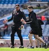1 June 2025; Jarly Óg Burns of Armagh in conversation with coach Kieran Donaghy, right, before the GAA Football All-Ireland Senior Championship Round 2 match between Dublin and Armagh at Croke Park in Dublin. Photo by Ray McManus/Sportsfile