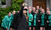 3 June 2025; Republic of Ireland's goalkeeper Grace Moloney takes a photograph with team-mates during a pre-match walk near their team hotel ahead of the UEFA Women's Nations League B match between Republic of Ireland and Slovenia at Páirc Uí Chaoimh in Cork. Photo by Stephen McCarthy/Sportsfile
