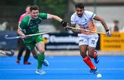 2 June 2025; Sanjay of India of Ireland in action against Ben Walker of Ireland during the Men's International Hockey match between Ireland and India at Pembroke Wanderers Hockey Club in Dublin. Photo by Shauna Clinton/Sportsfile