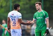 2 June 2025; Lee Cole of Ireland and Sanjay of India shake hands after the Men's International Hockey match between Ireland and India at Pembroke Wanderers Hockey Club in Dublin. Photo by Shauna Clinton/Sportsfile